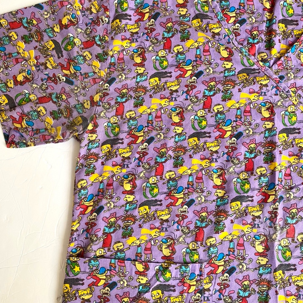 Nickelodeon Lavender Cartoon Character All-Over Print Scrub Top